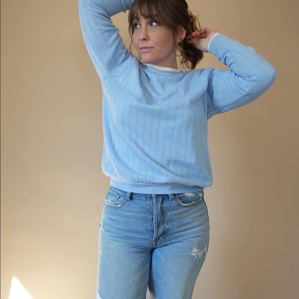 Baby blue vintage long sleeve. Floral embroidered pattern on collar.